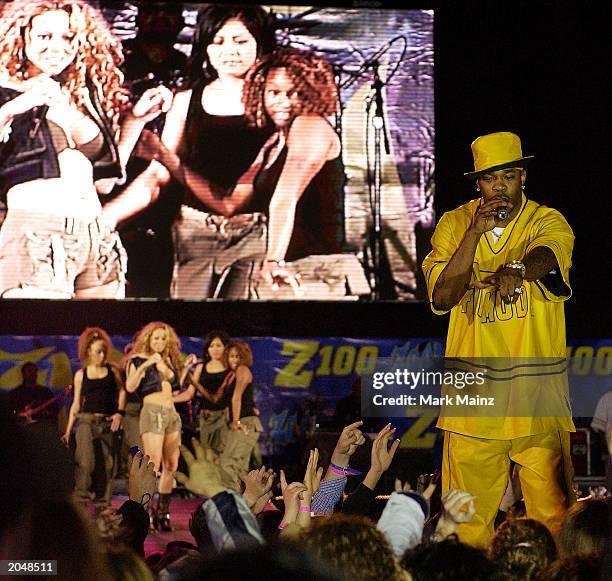Zootopia Rapper Mariah Carey And Busta Rhymes In Concert Photos and Premium High Res ...