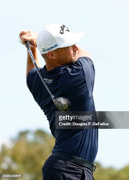 Alex Noren of Sweden plays his shot from the 11th tee during the first round of The Cognizant Classic in The Palm Beaches at PGA National Resort And...