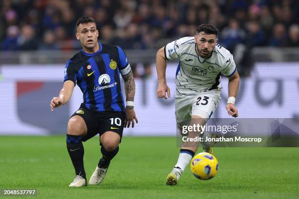 Lautaro Martinez of FC Internazionale threads the ball into the path of Henrikh Mkhitaryan in the build up to Matteo Darmian's opening goal during...