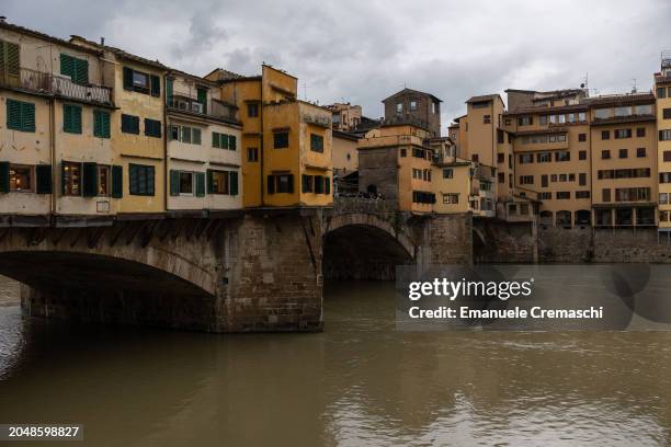General view shows the Ponte Vecchio medieval arch bridge over the Arno river on February 29, 2024 in Florence, Italy. The historic centre of...