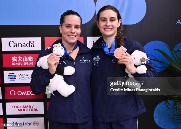 Anabelle Smith and Maddison Keeney of Australia pose with their bronze medals after finishing third in the Women's 3m Synchronized Springboard Final...