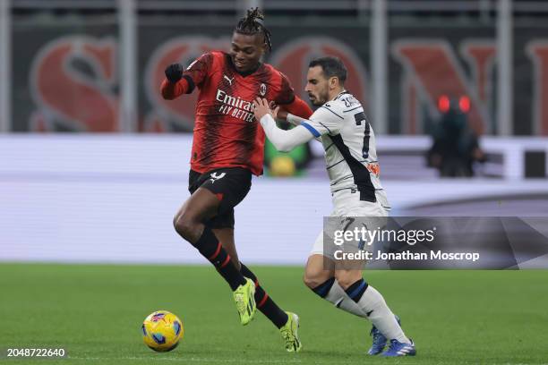 Davide Zappacosta of Atalanta clashes with Rafael Leao of AC Milan during the Serie A TIM match between AC Milan and Atalanta BC at Stadio Giuseppe...