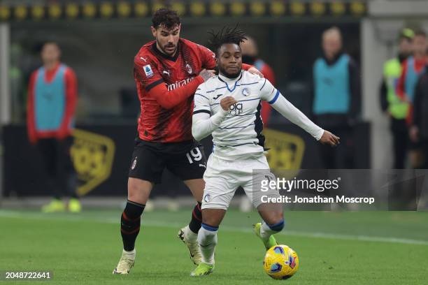 Theo Hernandez of AC Milan clashes with Ademola Lookman of Atalanta during the Serie A TIM match between AC Milan and Atalanta BC at Stadio Giuseppe...