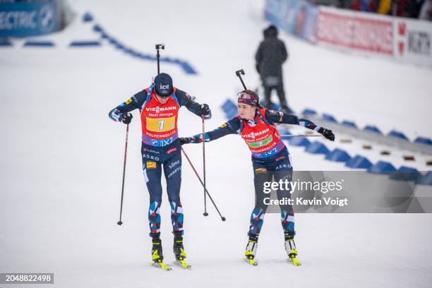 Tarjei Boe of Norway and Ida Lien of Norway in action during the Mixed Relay at the BMW IBU World Cup Biathlon Oslo - Holmenkollen on March 3, 2024...