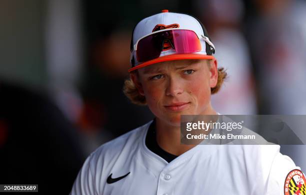 Jackson Holliday of the Baltimore Orioles looks on during a spring training game against the Pittsburgh Pirates at Ed Smith Stadium on February 29,...
