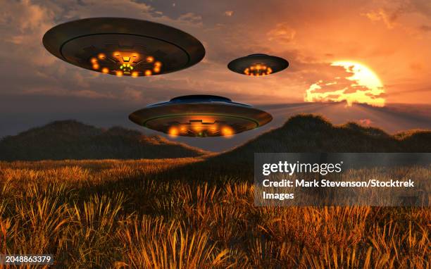 stockillustraties, clipart, cartoons en iconen met ufo's hovering over a wheat field while in the process of making crop circles - graancirkel