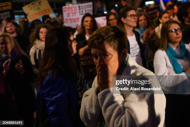 Member of 'Women Wage Peace' reacts during a speech by a mother whose son, and IDF soldier, was killed on October 7th while calling for a ceasefire...