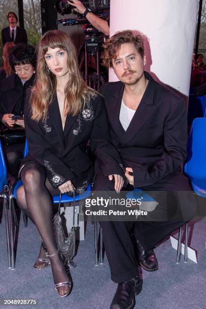 Ari Fournier and Cole Sprouse attends the Rabanne Womenswear Fall/Winter 2024-2025 show as part of Paris Fashion Week on February 29, 2024 in Paris,...