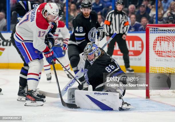 Montreal Canadiens right wing Josh Anderson shoots at point blank and Tampa Bay Lightning goaltender Andrei Vasilevskiy makes a pad save during the...