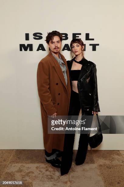 Cole Sprouse and Ari Fournier attend the Isabel Marant Womenswear Fall/Winter 2024-2025 show as part of Paris Fashion Week on February 29, 2024 in...