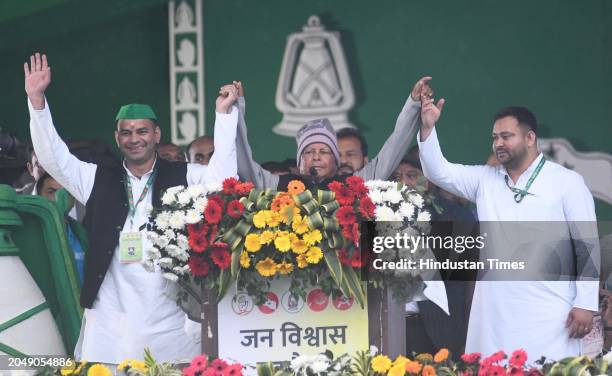 RJD Chief Lalu Prasad Yadav with party leaders Tejashwi Yadav and Tej ...