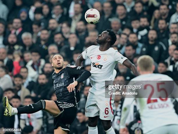 Cenk Tosun of Besiktas in action against Davinson Sanchez of Galatasaray during the Turkish Super Lig week 28 football match between Besiktas and...