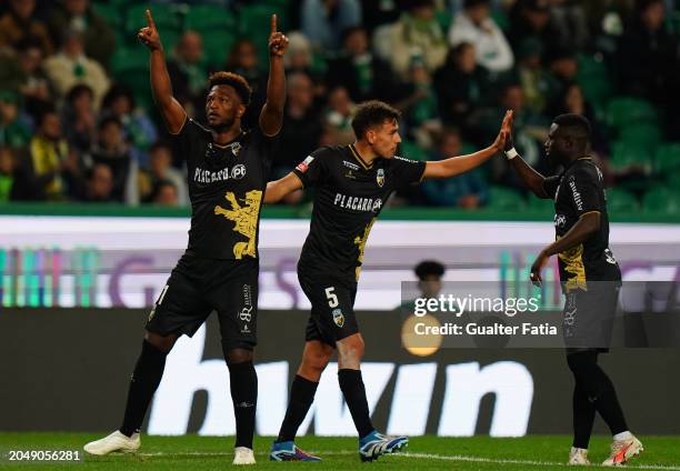 Ze Luis of SC Farense celebrates with teammates after scoring a goal during the Liga Portugal Betclic match between Sporting CP and SC Farense at...