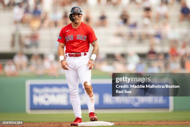 Jarren Duran of the Boston Red Sox looks on after stealing second during a Grapefruit League Spring Training game against the Toronto Blue Jays at...