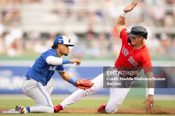 Jarren Duran of the Boston Red Sox steals second during a Grapefruit League Spring Training game against the Toronto Blue Jays at JetBlue Park at...