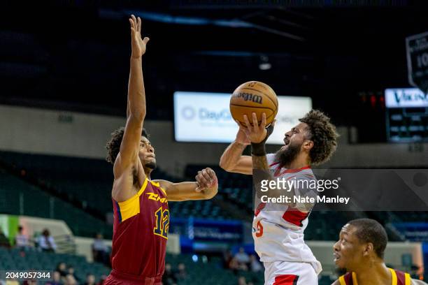 March 3: Jalen Harris of the Windy City Bulls shoots a layup over Alex Ford of the Cleveland Charge during the game on March 3, 2024 in Cleveland,...