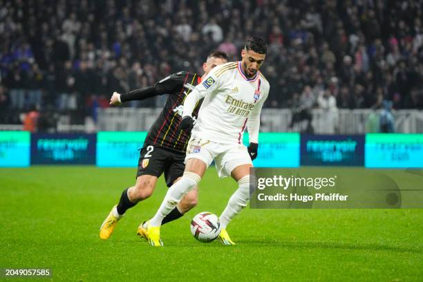 Said BENRAHMA of Olympique Lyonnais and Ruben AGUILAR of Lens during the Ligue 1 Uber Eats match between Lyon and Lens at Groupama Stadium on March...