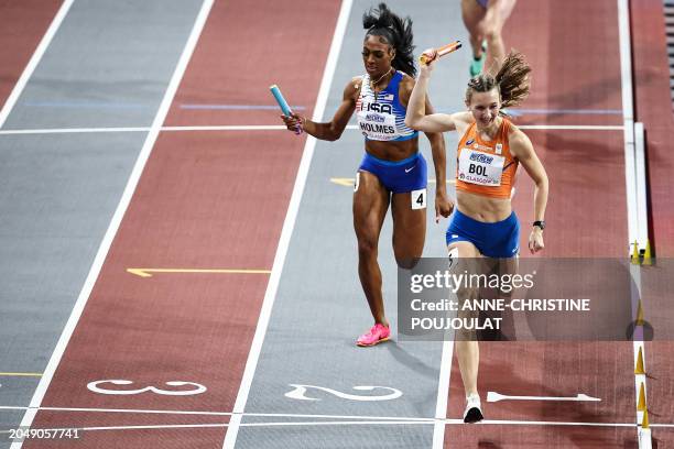 Netherlands' Femke Bol crosses the finish line past USA's Alexis Holmes to win the Women's 4x400m relay final during the Indoor World Athletics...