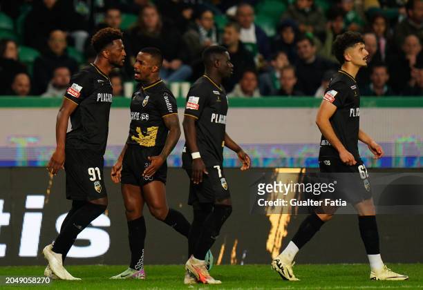 Ze Luis of SC Farense celebrates with teammates after scoring his team's second goal during the Liga Portugal Betclic match between Sporting CP and...