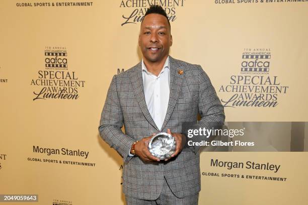 Deon Taylor poses with the Horizon Award at the AAFCA Special Achievement Awards Luncheon held at the Los Angeles Athletic Club on March 3, 2024 in...