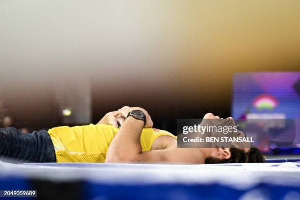 Sweden's Armand Duplantis reacts after failing to clear the bar at 6.24 as he competes in the Men's Pole Vault final during the Indoor World...