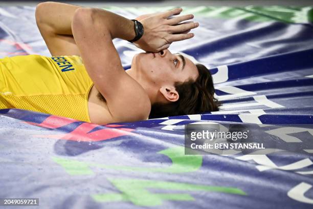 Sweden's Armand Duplantis reacts after failing to clear the bar at 6.24 as he competes in the Men's Pole Vault final during the Indoor World...
