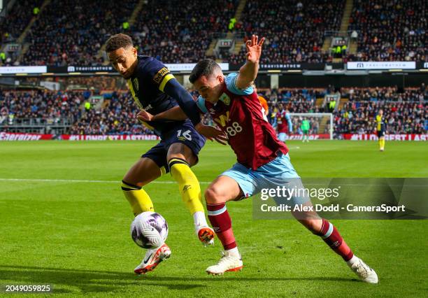 Burnley's Josh Cullen vies for possession with Bournemouth's Marcus Tavernier during the Premier League match between Burnley FC and AFC Bournemouth...