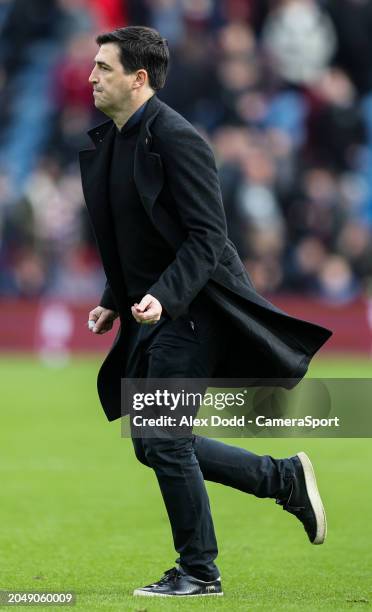 Bournemouth manager Andoni Iraola walks over the pitch at half time of the Premier League match between Burnley FC and AFC Bournemouth at Turf Moor...