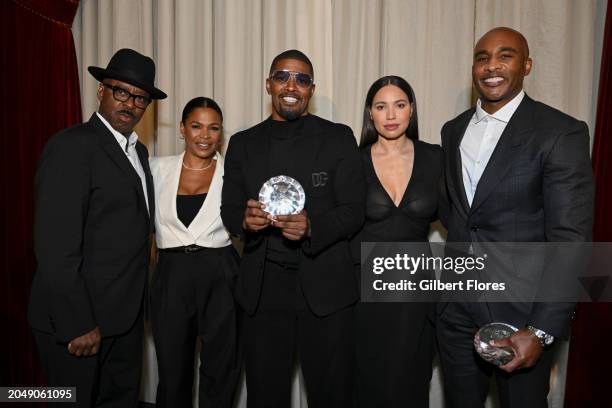 Courtney B. Vance, Nia Long, Jamie Foxx, Jurnee Smollett and Datari Turner pose with the Producers Award for Foxxhole Productions at the AAFCA...