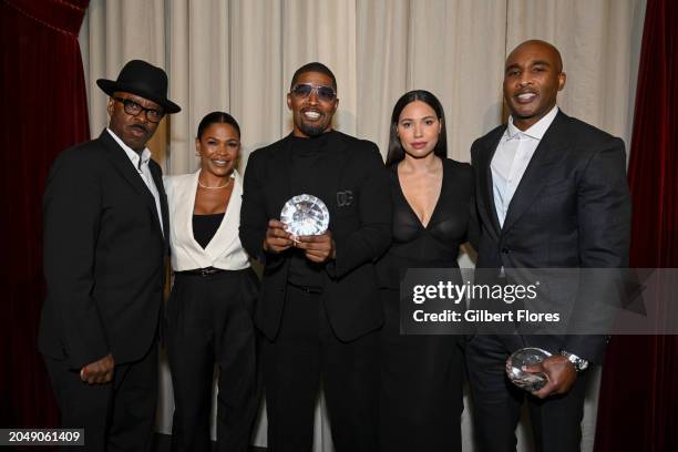 Courtney B. Vance, Nia Long, Jamie Foxx, Jurnee Smollett and Datari Turner pose with the Producers Award for Foxxhole Productions at the AAFCA...