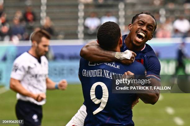 France's Aaron Grandidier Nkanang and William Iraghua celebrate their victory over Ireland during the 2024 HSBC Rugby Sevens Los Angeles tournament...
