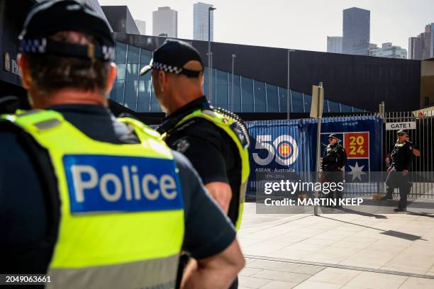 Police stand outside the venue for the Australia-ASEAN summit in Melbourne on March 4, 2024.