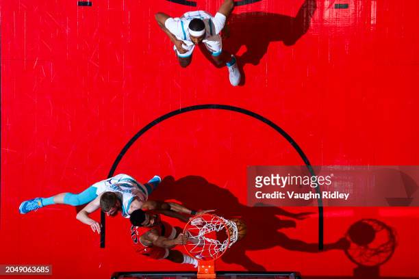 Ochai Agbaji of the Toronto Raptors dunks the ball during the game against the Charlotte Hornets on March 3, 2024 at the Scotiabank Arena in Toronto,...
