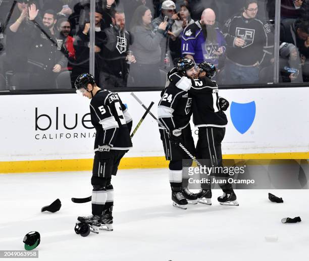 Phillip Danault and Tevor Moore of the Los Angeles Kings celebrate Denault's hat trick during the game against the New Jersey Devils at Crypto.com...