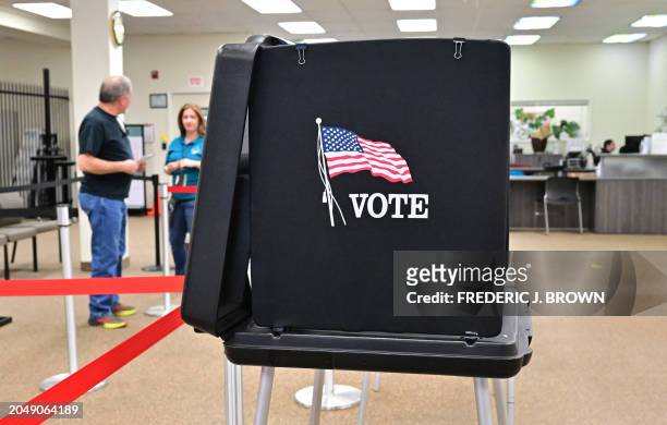 People arrive to cast their ballots at the Shasta County Clerk & Registrar of Voters offices on February 23, 2024 in Redding in Northern Califonia's...