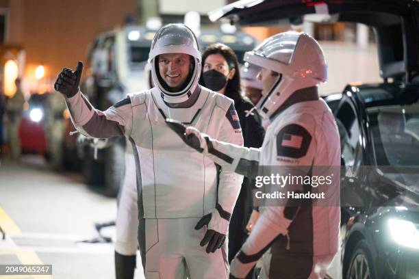 In this handout photo provided by NASA, Russian cosmonaut and Mission Specialist Alexander Grebenkin, Mission Specialist Jeanette Epps, Commander...