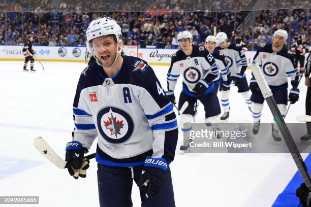 Josh Morrissey of the Winnipeg Jets heads to the bench to celebrate his third period goal against the Buffalo Sabres during an NHL game on March 3,...