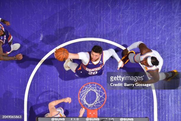 Jusuf Nurkic of the Phoenix Suns drives to the basket during the game against the Oklahoma City Thunder on March 3, 2024 at Footprint Center in...