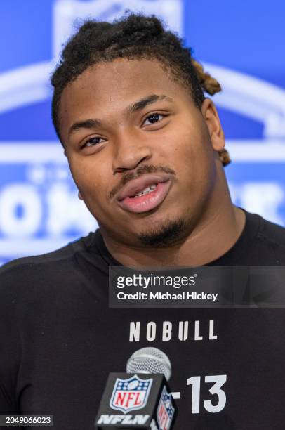 Kris Jenkins #DL13 of the Michigan Wolverines speaks to the media during the 2024 NFL Draft Combine at Lucas Oil Stadium on February 28, 2024 in...