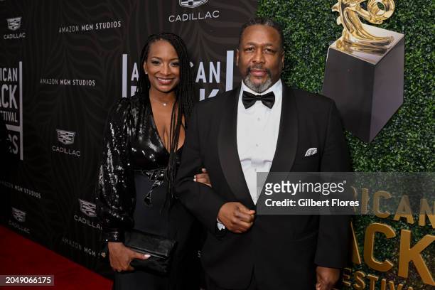 Erika Woods and Wendell Pierce at the 6th American Black Film Festival Honors held at the SLS Hotel, a Luxury Collection Hotel, Beverly Hills on...