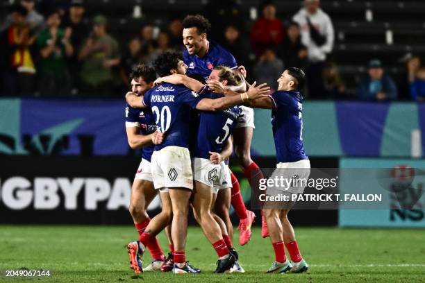 France's Theo Forner celebrates with teammates after scoring a try during the 2024 HSBC Rugby Sevens Los Angeles tournament final men's match between...