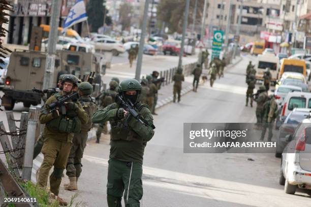 Israeli troops raid the Al-Amari refugee camp near Ramallah, in the occupied West Bank, on March 4, 2024.