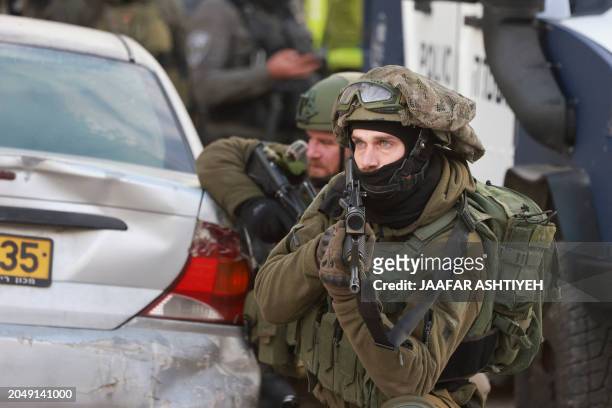 Israeli troops raid the Al-Amari refugee camp near Ramallah, in the occupied West Bank, on March 4, 2024.
