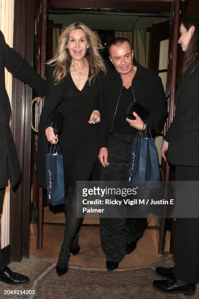 Melissa Odabash and Julien Macdonald leaving Langan's Mayfair after an intimate dinner with friends celebrating St David's Day with Cygnet Gin on...