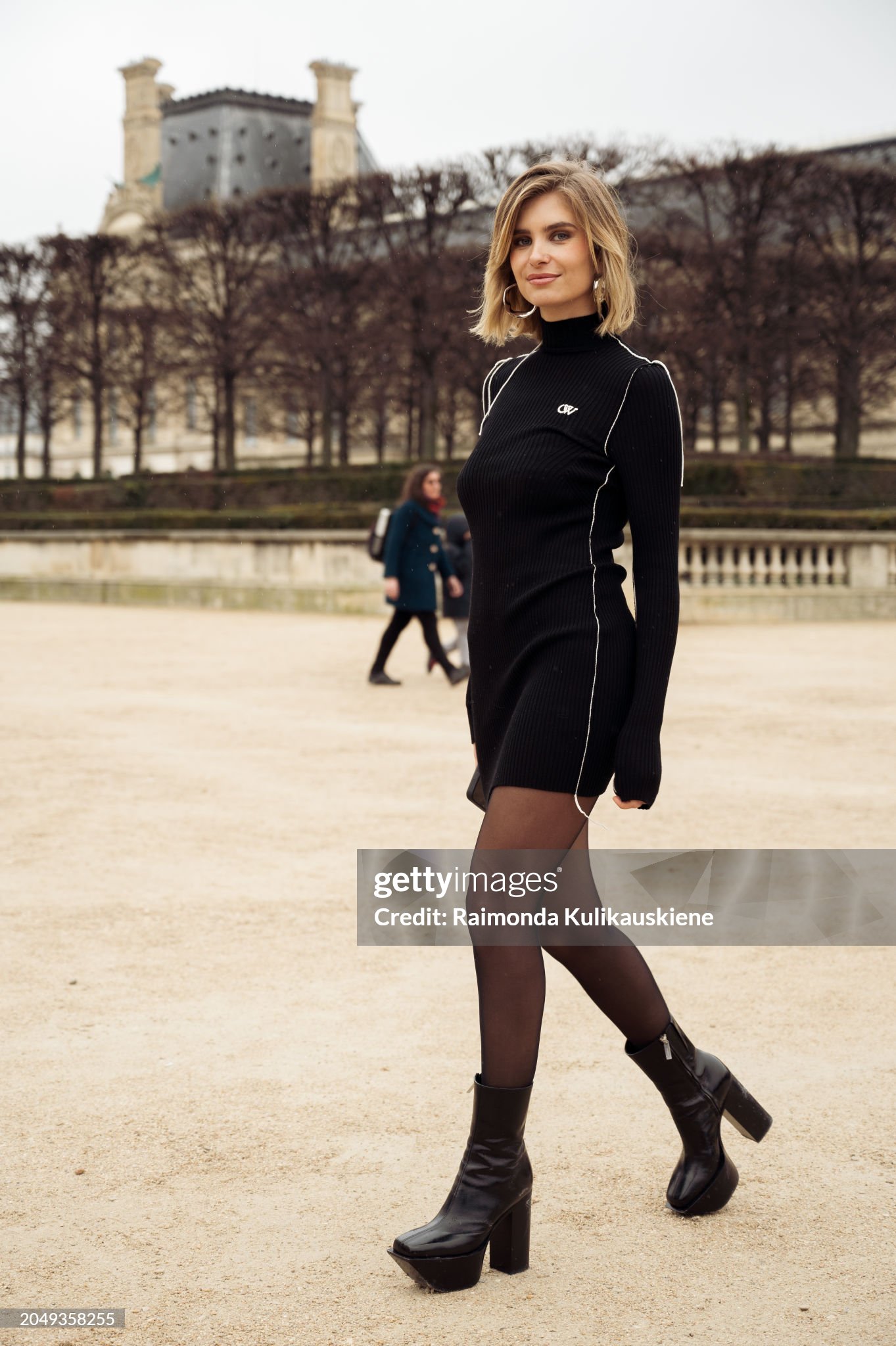 paris-france-xenia-adons-wears-black-tights-black-platform-high-heels-and-black-mini-dress.jpg