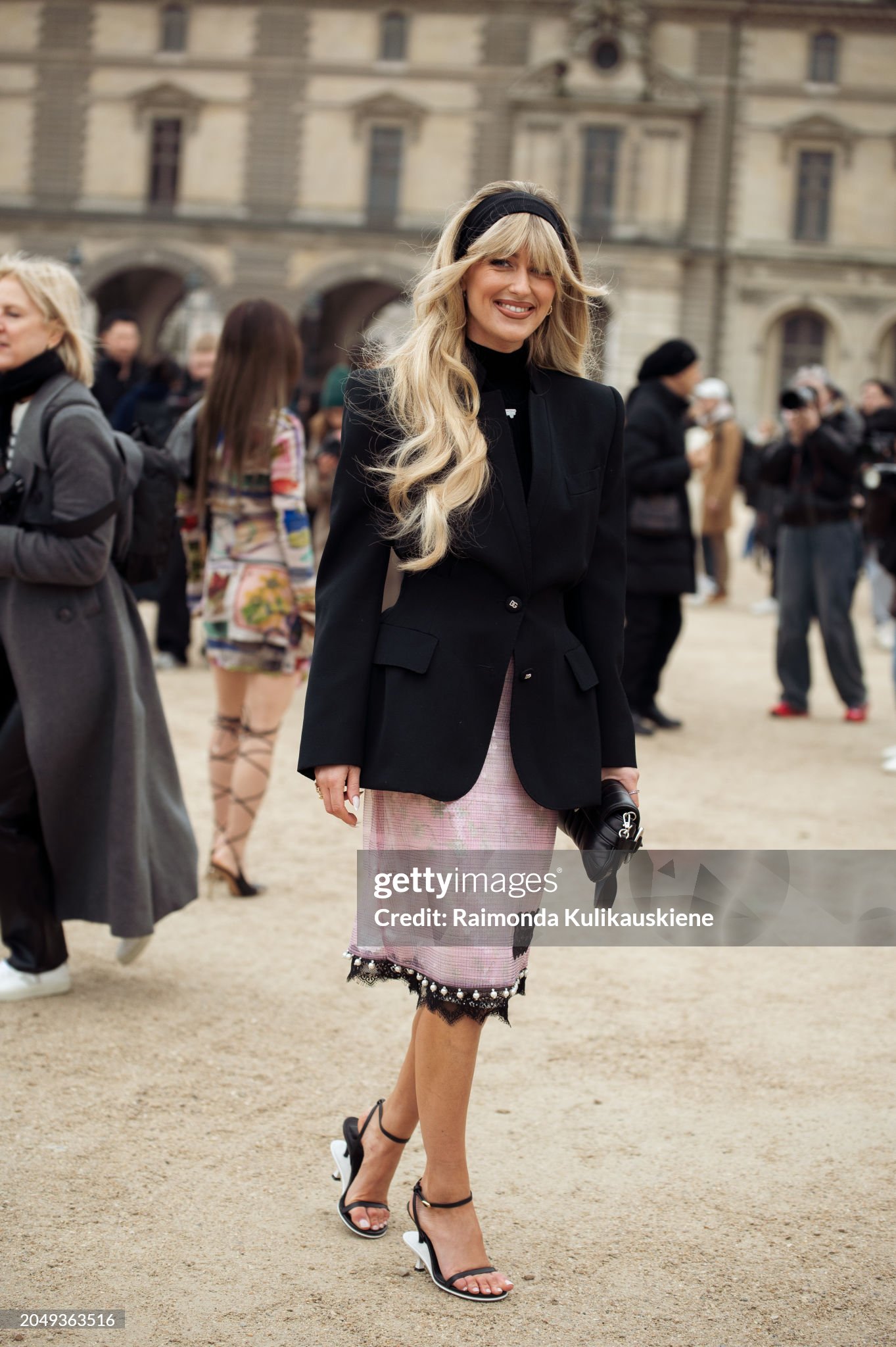 paris-france-emili-sindlev-wears-a-pink-pencil-skirt-with-black-lace-decoration-a-black-blazer.jpg