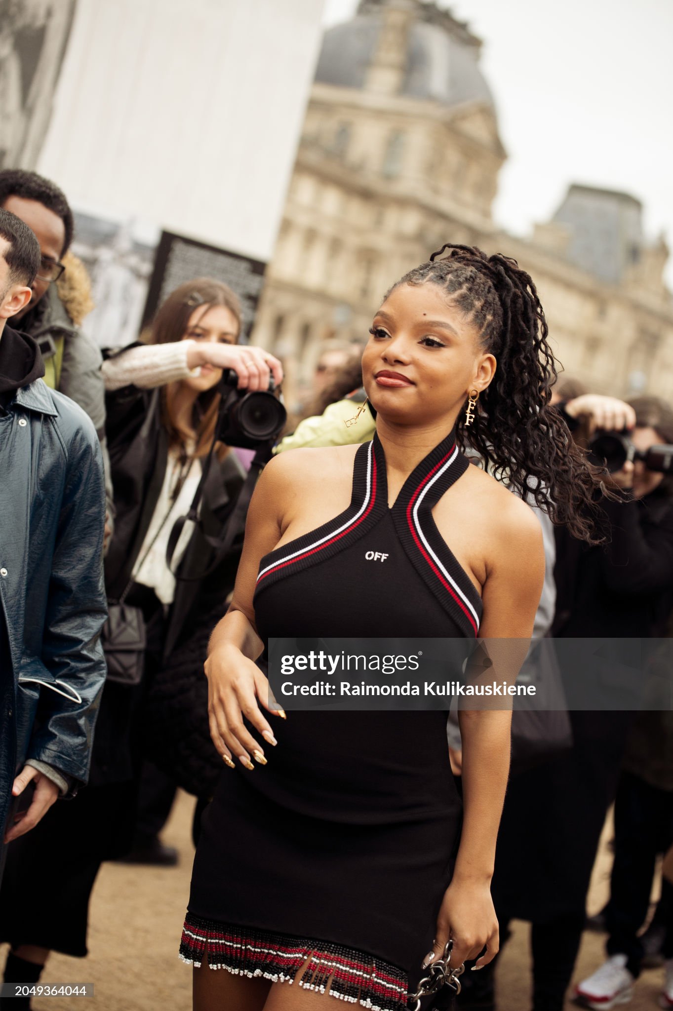 paris-france-halle-bailey-wears-a-black-mini-dress-with-white-and-red-stripes-outside-off.jpg