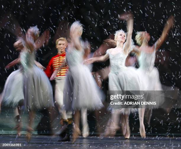 Dancers perform 'The Snowflakes' scene in the Nutcracker during a preview at The Royal Opera House in London, 07 December 2007. Peter Wright's...