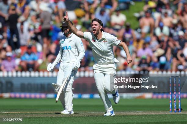 Mitchell Marsh of Australia celebrates after taking the wicket of youduring day two of the First Test in the series between New Zealand and Australia...