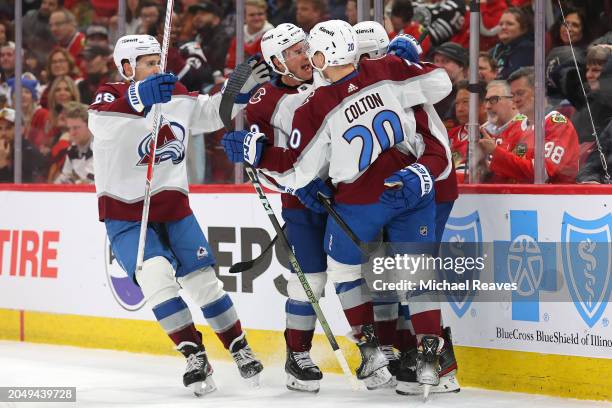 Zach Parise of the Colorado Avalanche celebrates with teammates after scoring against the Chicago Blackhawks during the first period at the United...